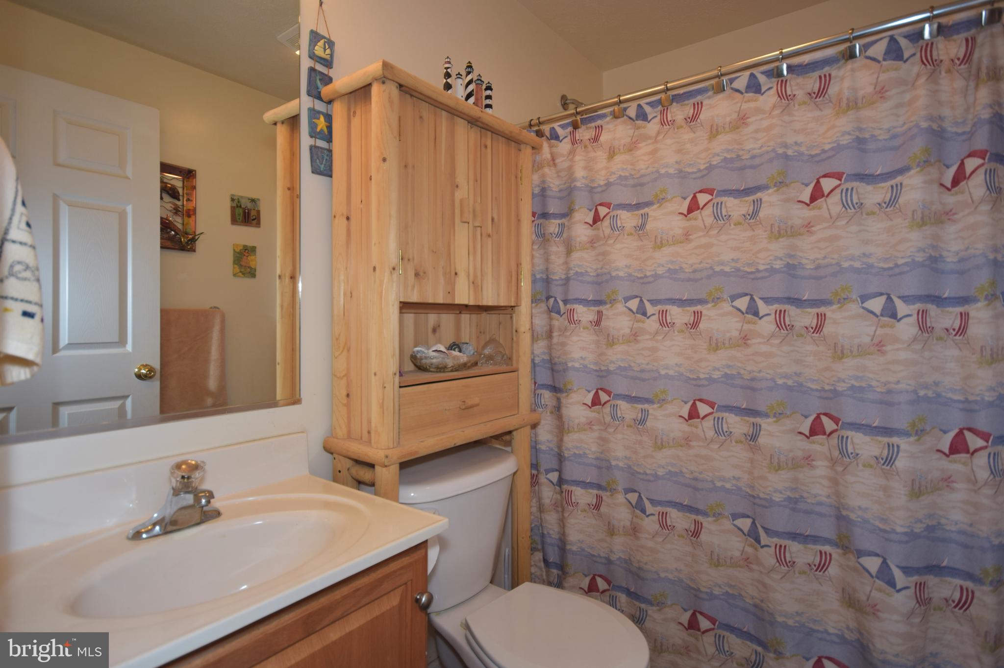97 Spring Hollow Road Front Royal, VA 22630 - Photo 35 of 38 a bathroom with a sink toilet and shower