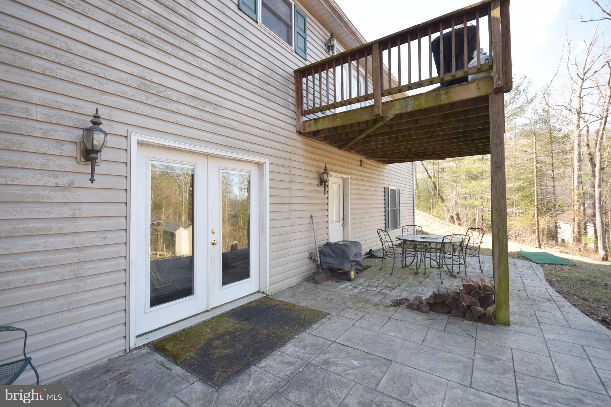 97 Spring Hollow Road Front Royal, VA 22630 - Photo 8 of 38 a view of a porch with furniture