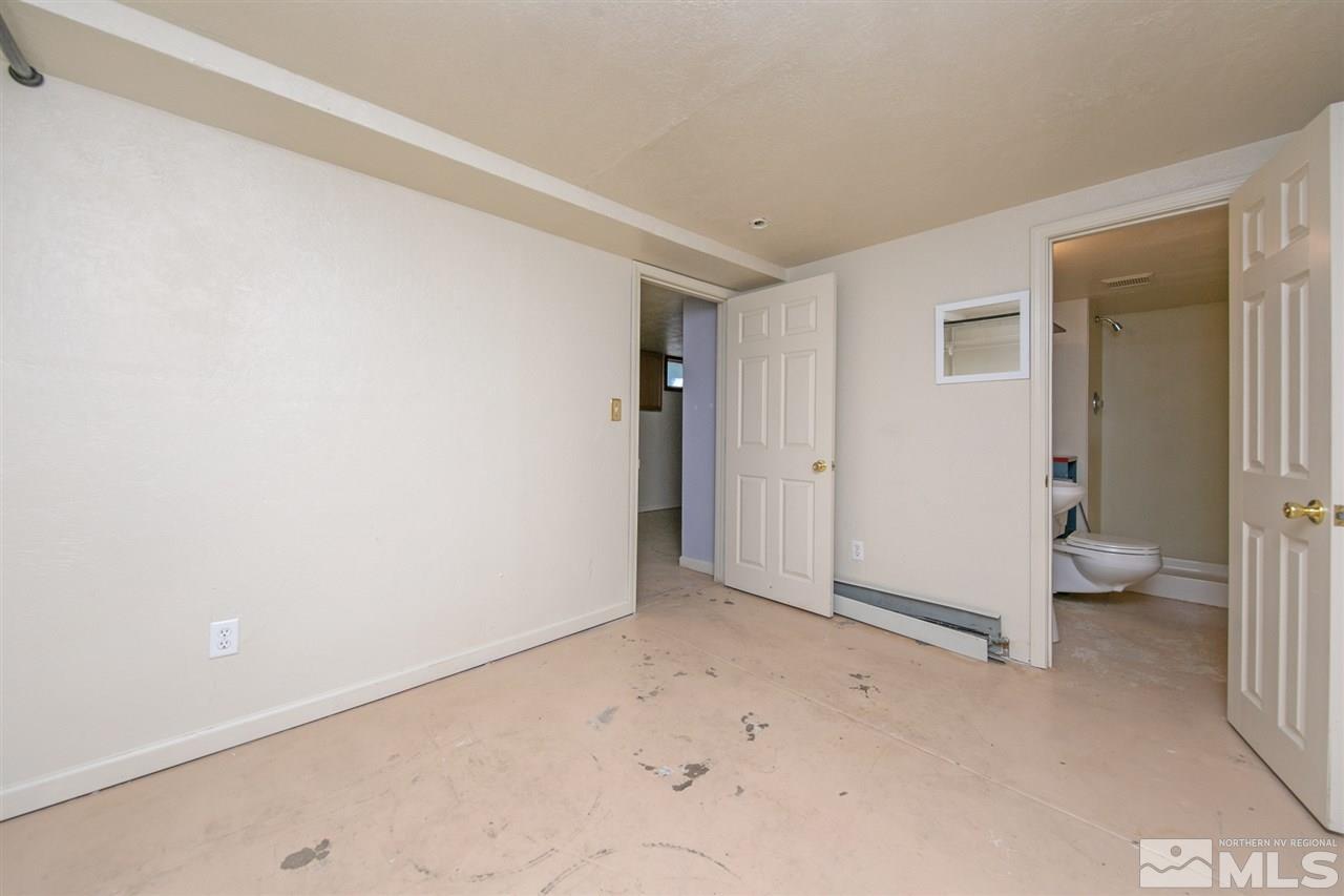 1130 West 1st Street Reno, NV 89503 - Photo 23 of 32 an empty room with a bathroom