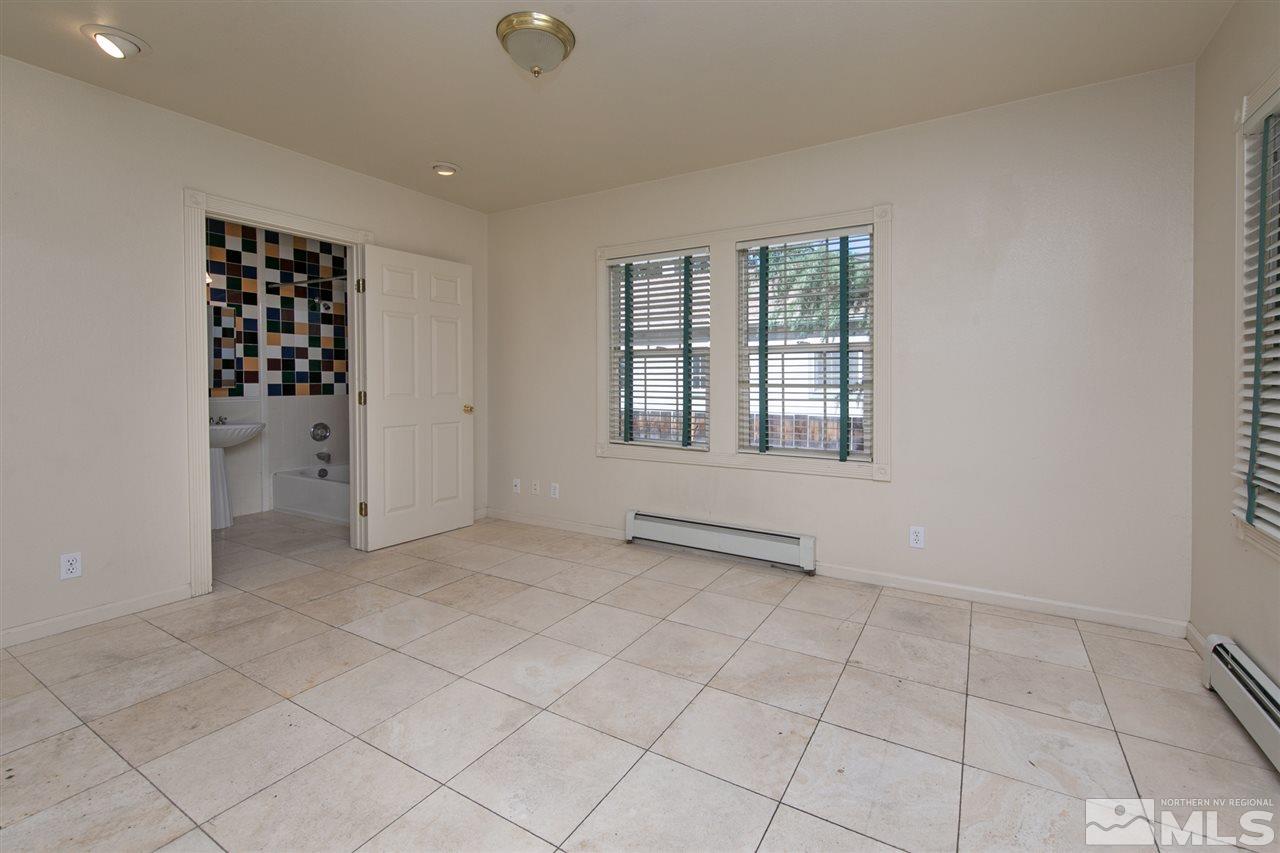 1130 West 1st Street Reno, NV 89503 - Photo 8 of 32 an empty room with windows