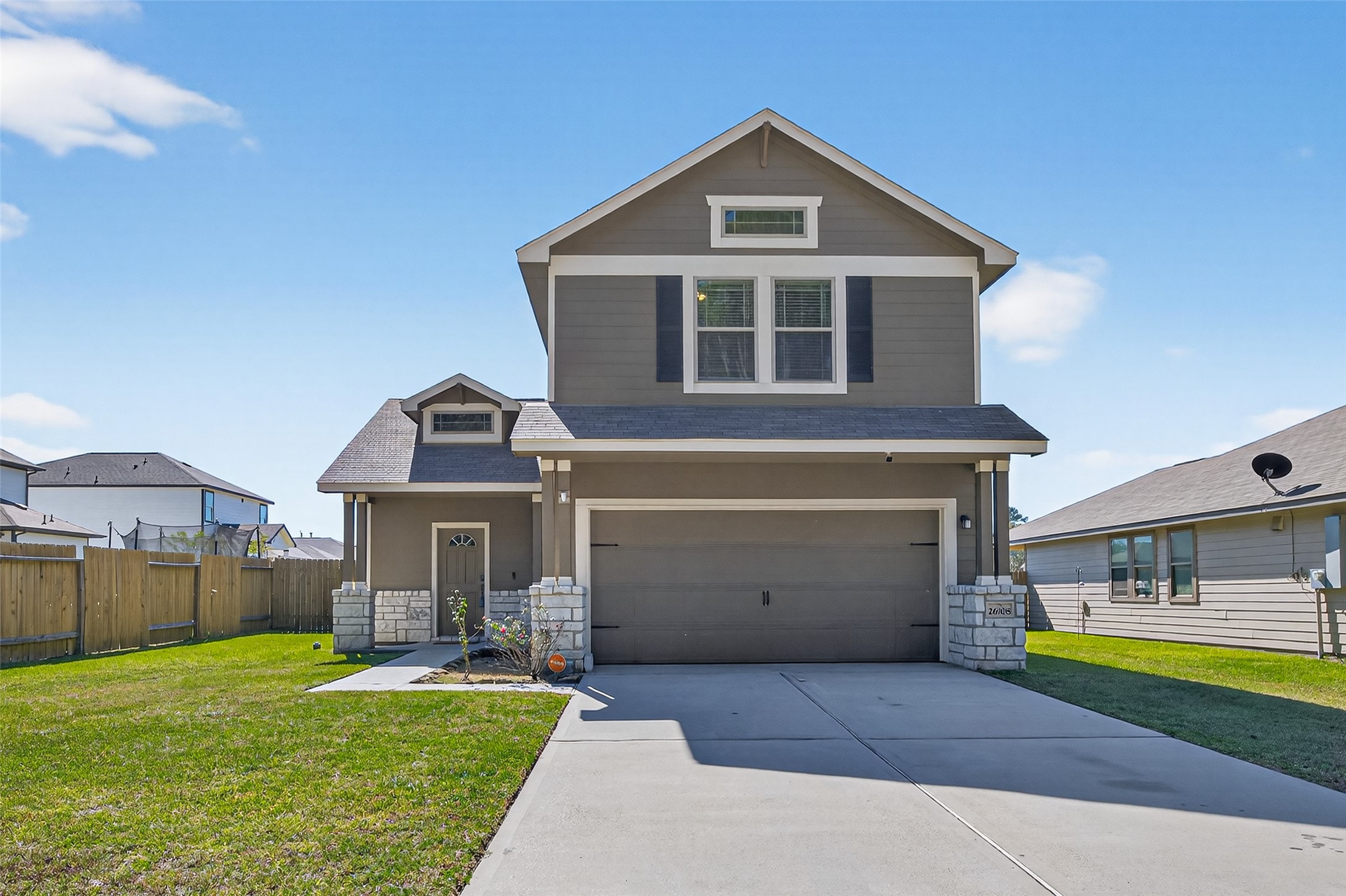 26108 Morgan Cemetery Road Cleveland, TX 77328 - Photo 1 of 39 a front view of a house with a yard