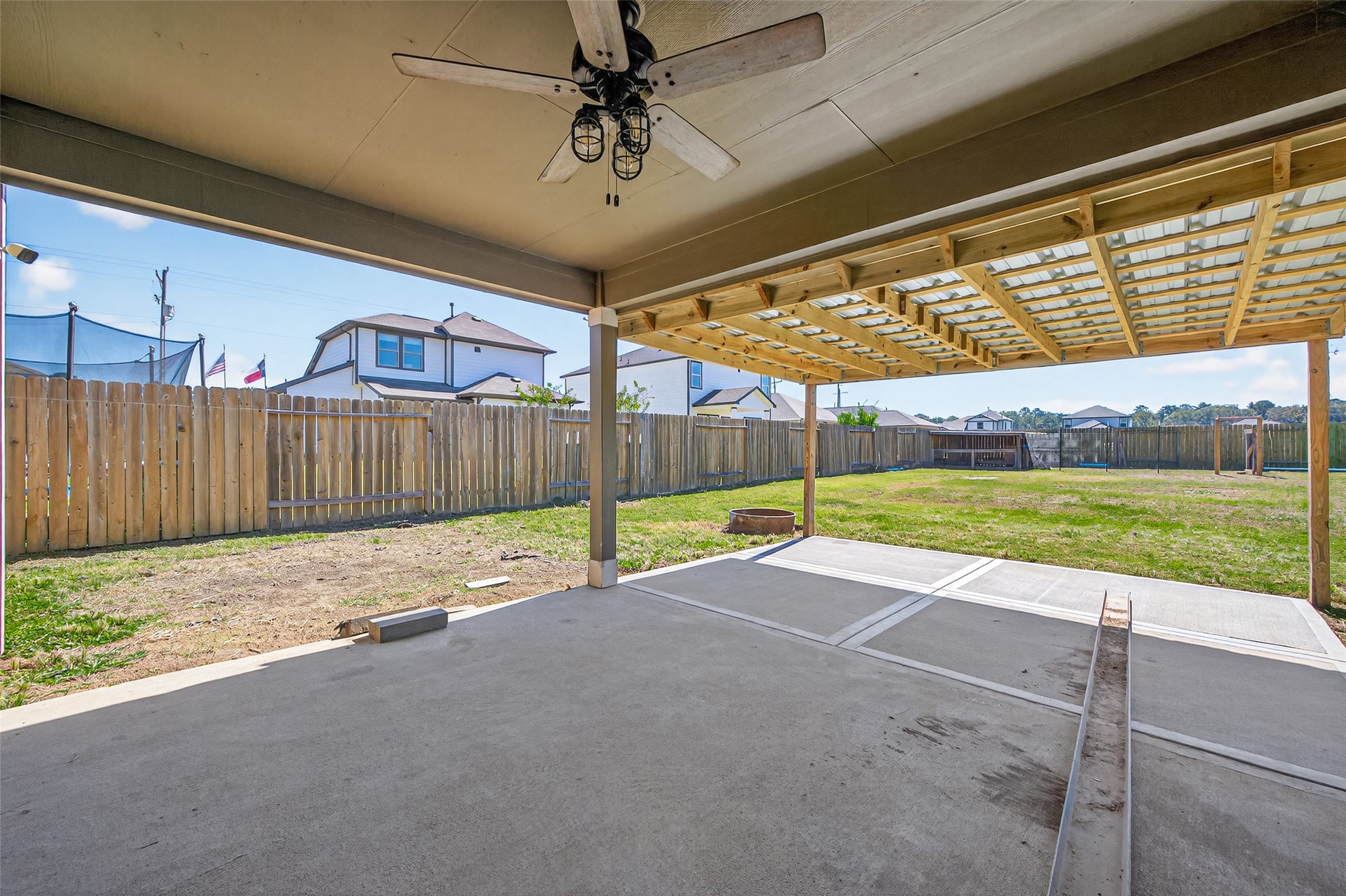 26108 Morgan Cemetery Road Cleveland, TX 77328 - Photo 29 of 39 a view of a backyard of a house