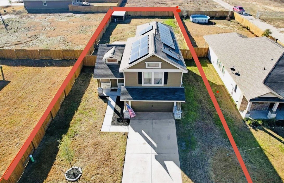 26108 Morgan Cemetery Road Cleveland, TX 77328 - Photo 39 of 39 a aerial view of a house with wooden stairs