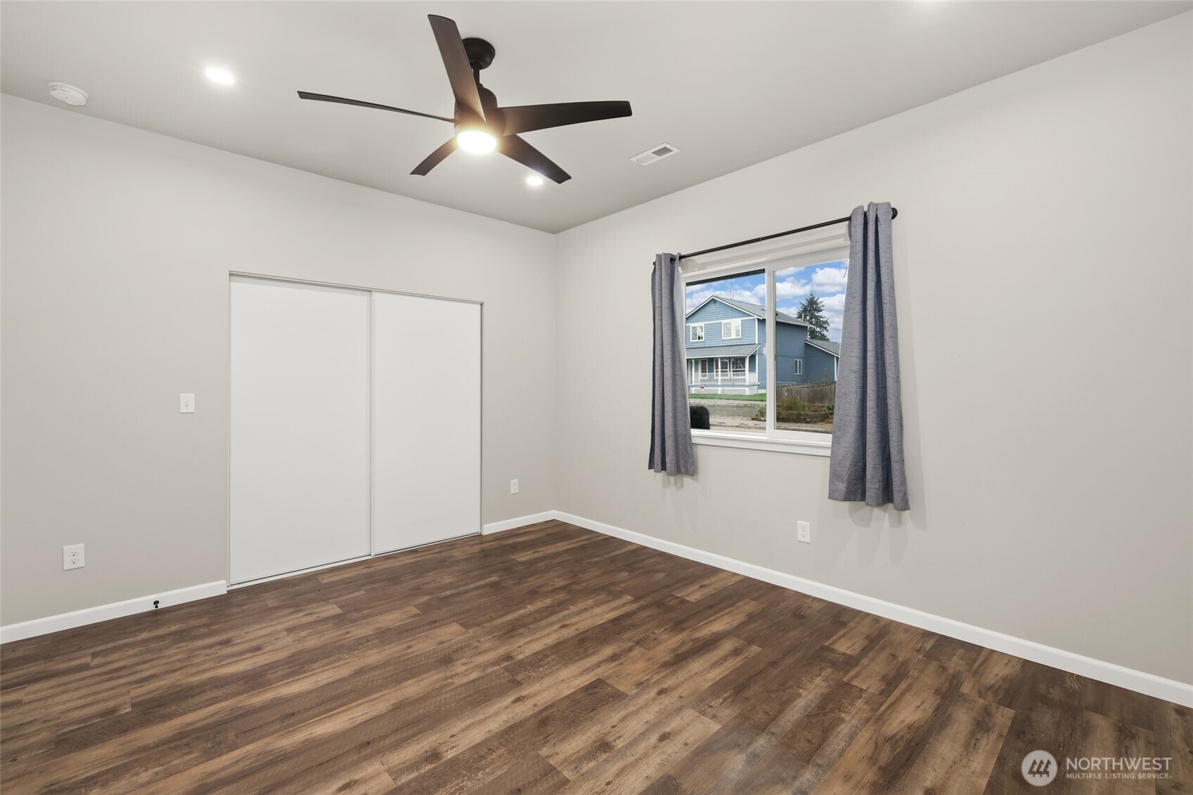 3626 East Howe Street Tacoma, WA 98404 - Photo 11 of 28 a view of an empty room with a window