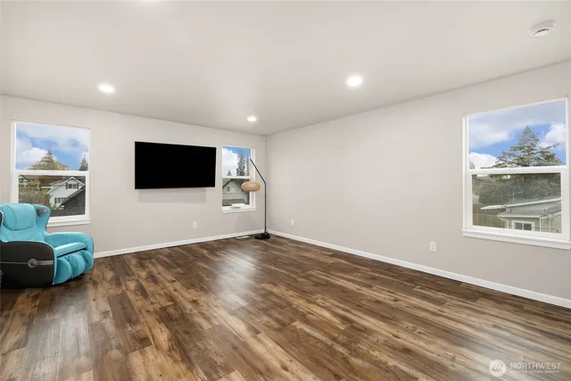 a view of livingroom with furniture and flat screen tv