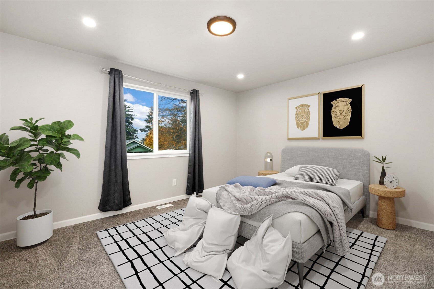 3626 East Howe Street Tacoma, WA 98404 - Photo 20 of 28 a bedroom with a bed and a potted plant