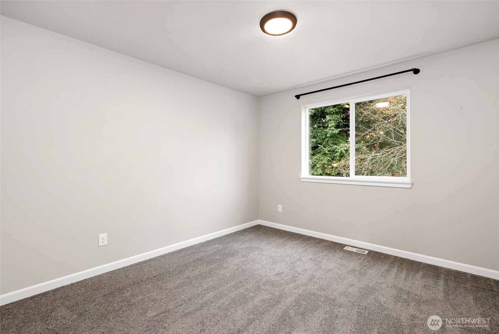3626 East Howe Street Tacoma, WA 98404 - Photo 23 of 28 an empty room with a window