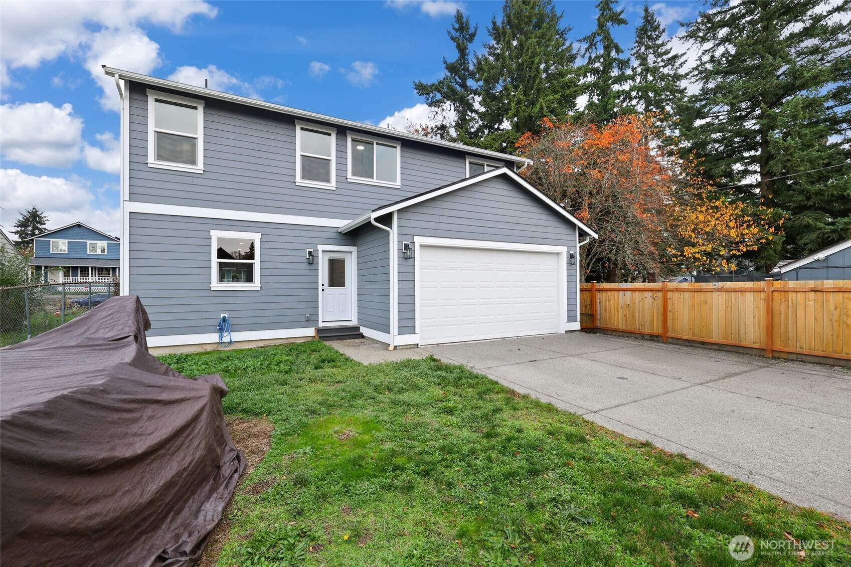 3626 East Howe Street Tacoma, WA 98404 - Photo 27 of 28 a view of backyard of house with outdoor seating