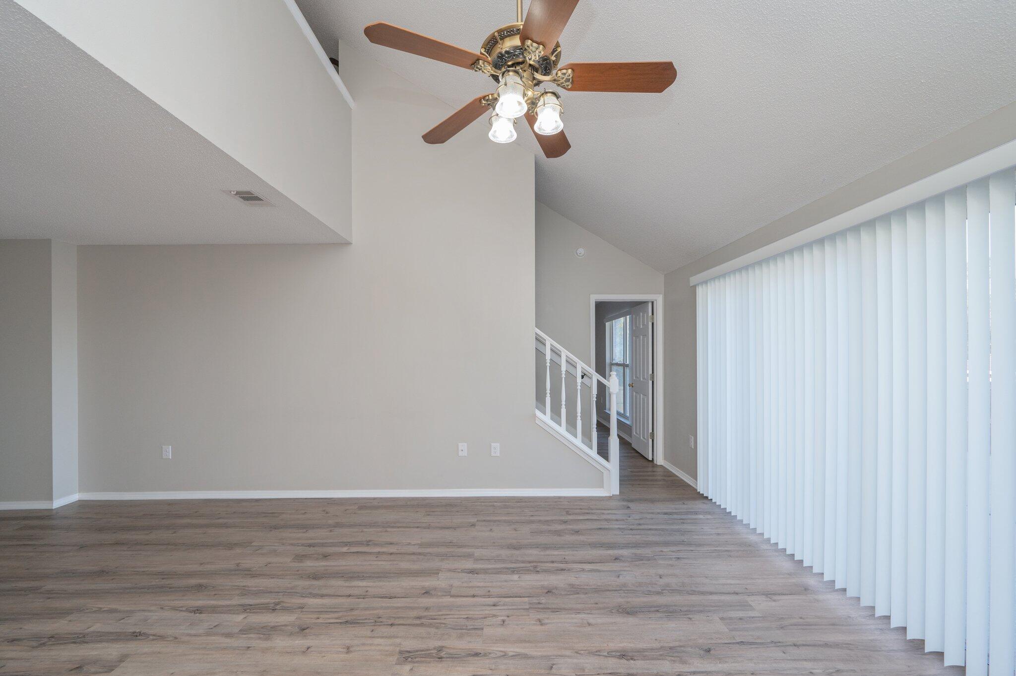 903 Twain Lane Crestview, FL 32536 - Photo 11 of 58 a view of entryway and hall with wooden floor