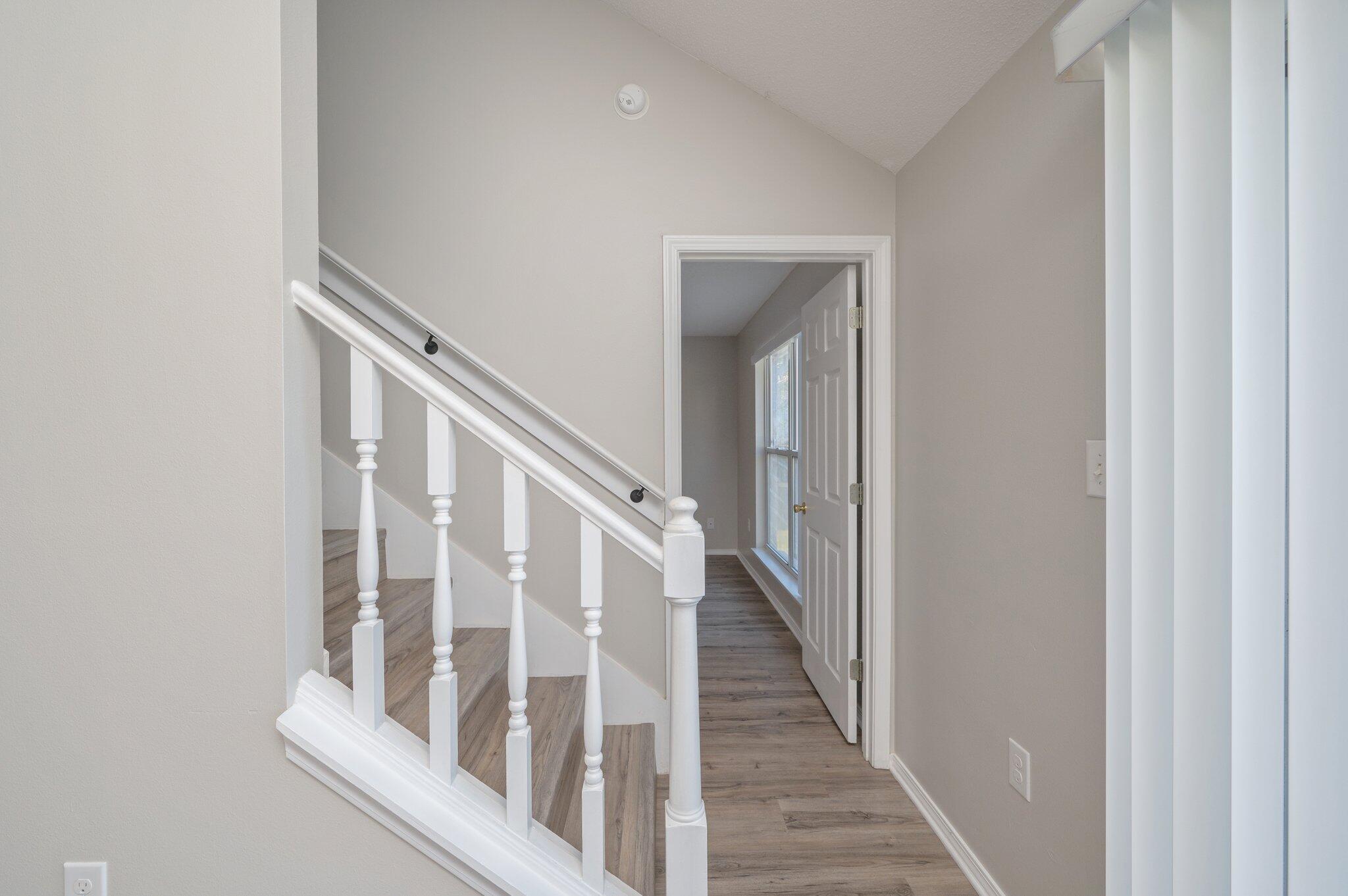 903 Twain Lane Crestview, FL 32536 - Photo 22 of 58 a view of staircase with railing and white walls