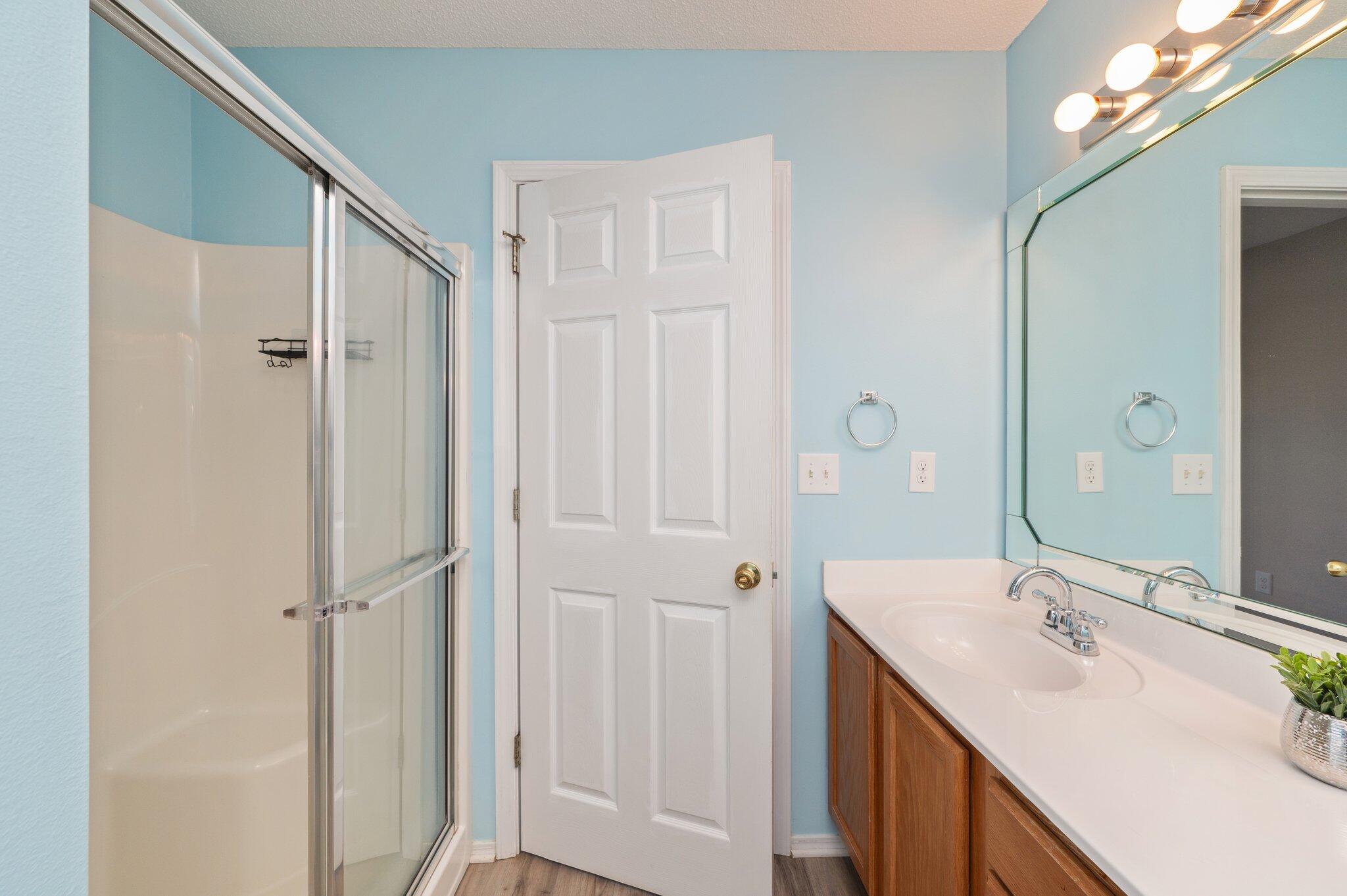 903 Twain Lane Crestview, FL 32536 - Photo 27 of 58 a bathroom with a sink and a mirror