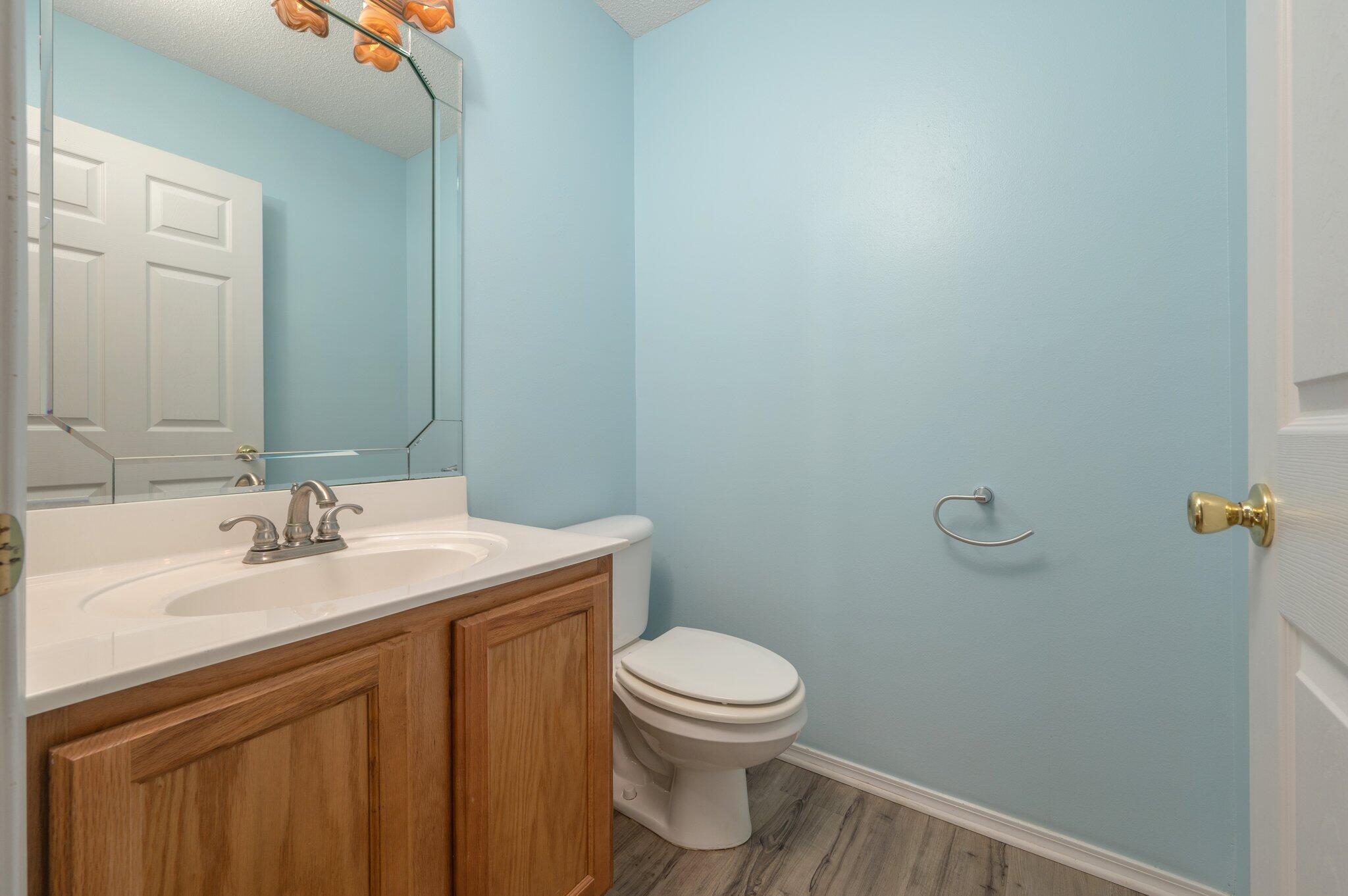 903 Twain Lane Crestview, FL 32536 - Photo 36 of 58 a bathroom with a sink a toilet and vanity