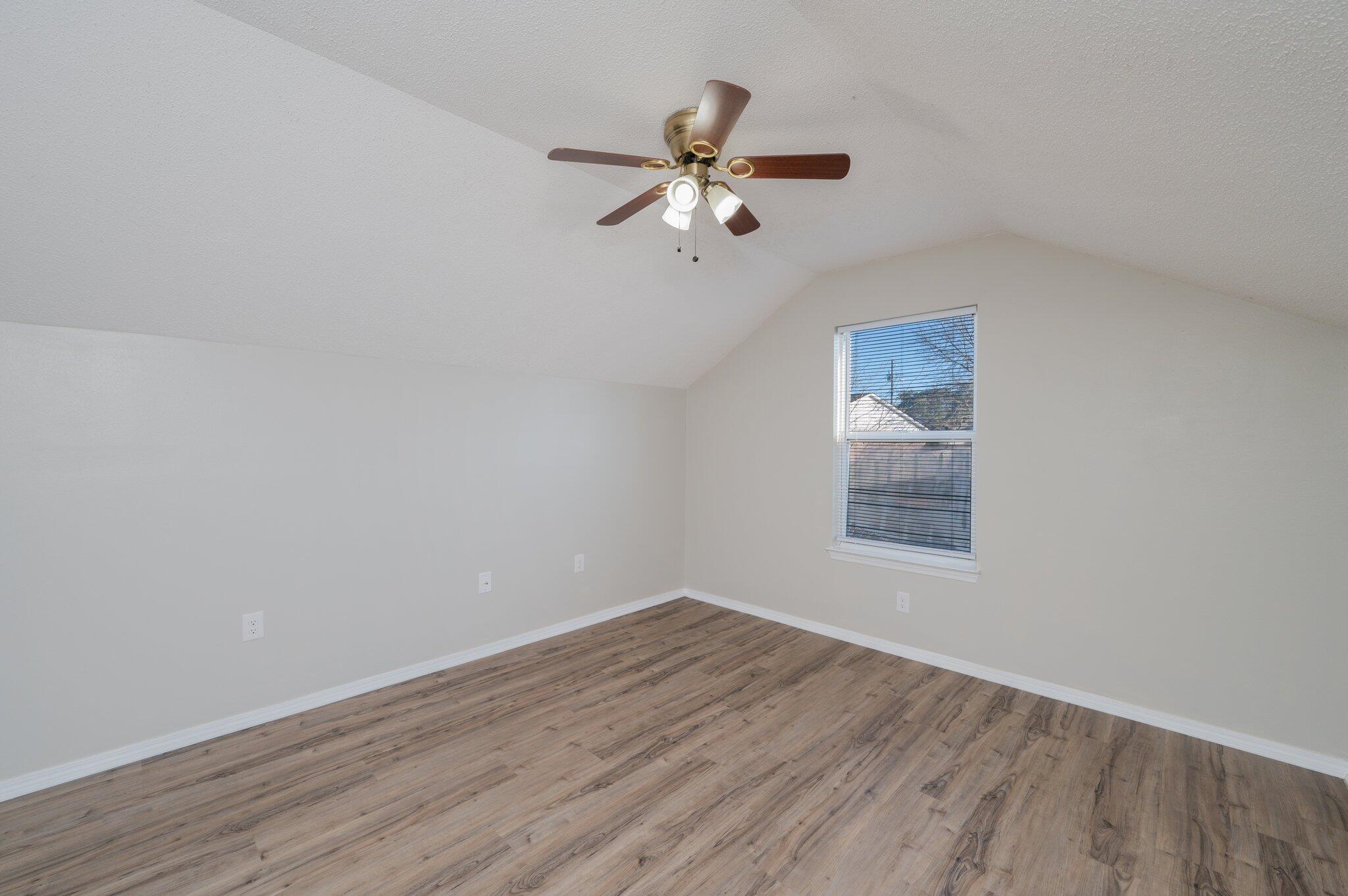 903 Twain Lane Crestview, FL 32536 - Photo 40 of 58 a view of empty room with wooden floor