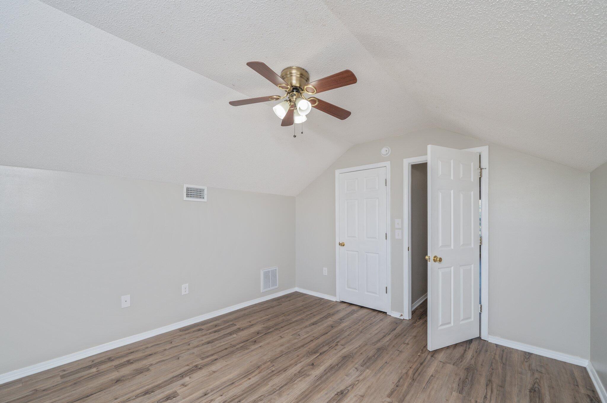 903 Twain Lane Crestview, FL 32536 - Photo 41 of 58 wooden floor in an empty room