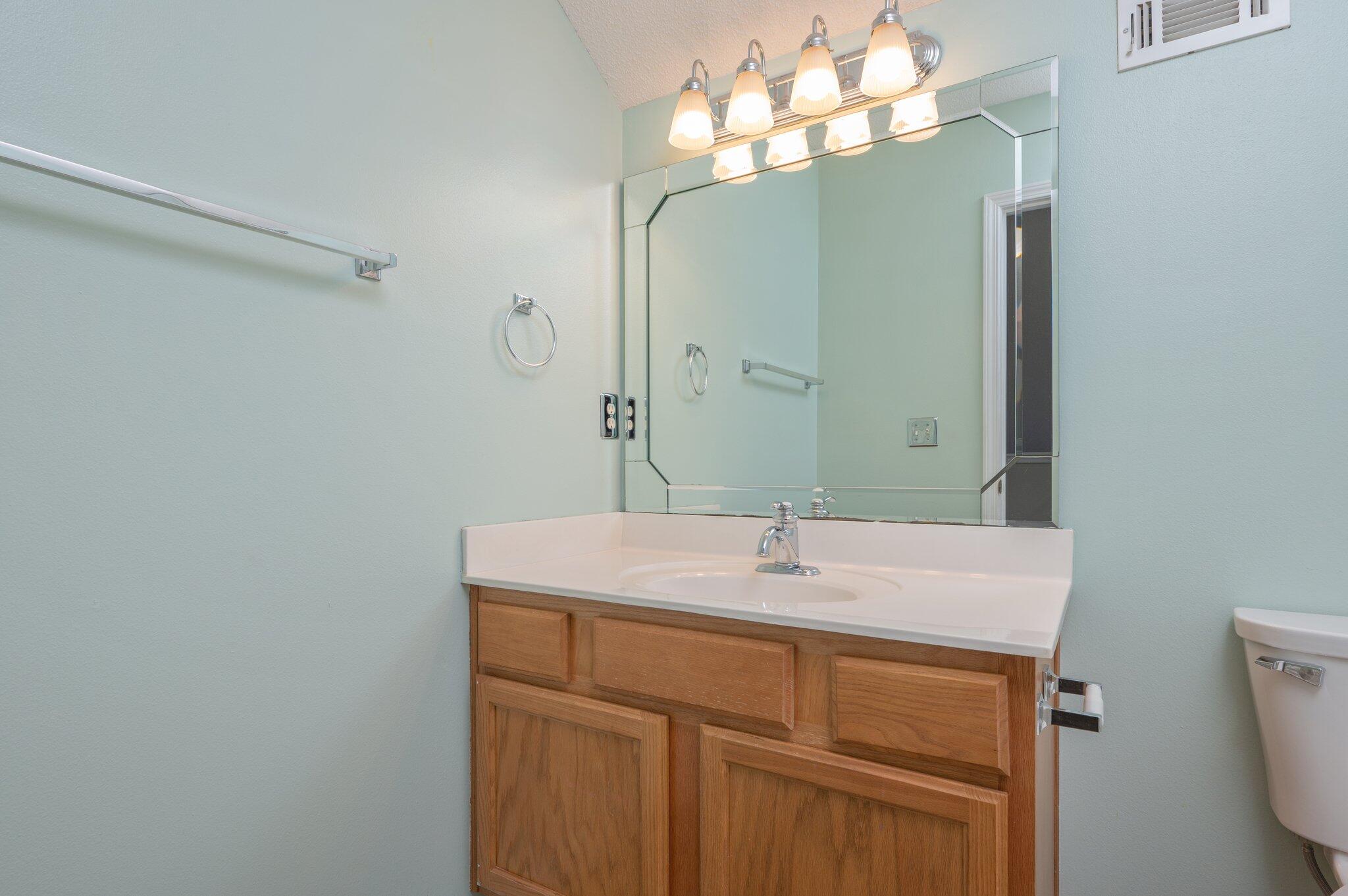 903 Twain Lane Crestview, FL 32536 - Photo 42 of 58 a bathroom with a sink and a mirror