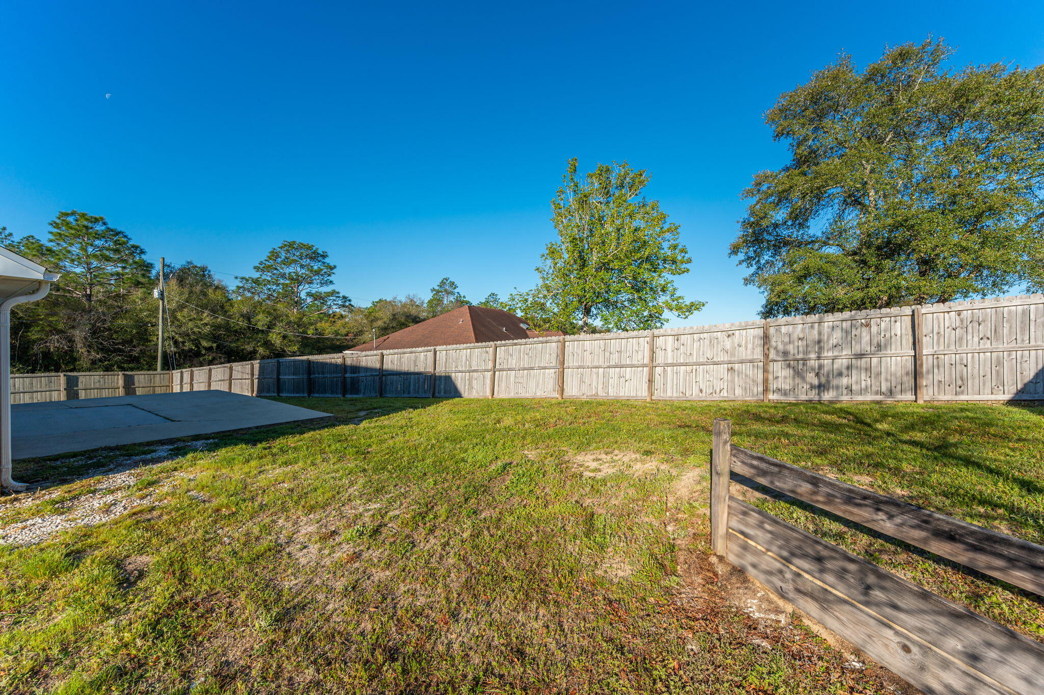903 Twain Lane Crestview, FL 32536 - Photo 46 of 58 a view of backyard with wooden fence