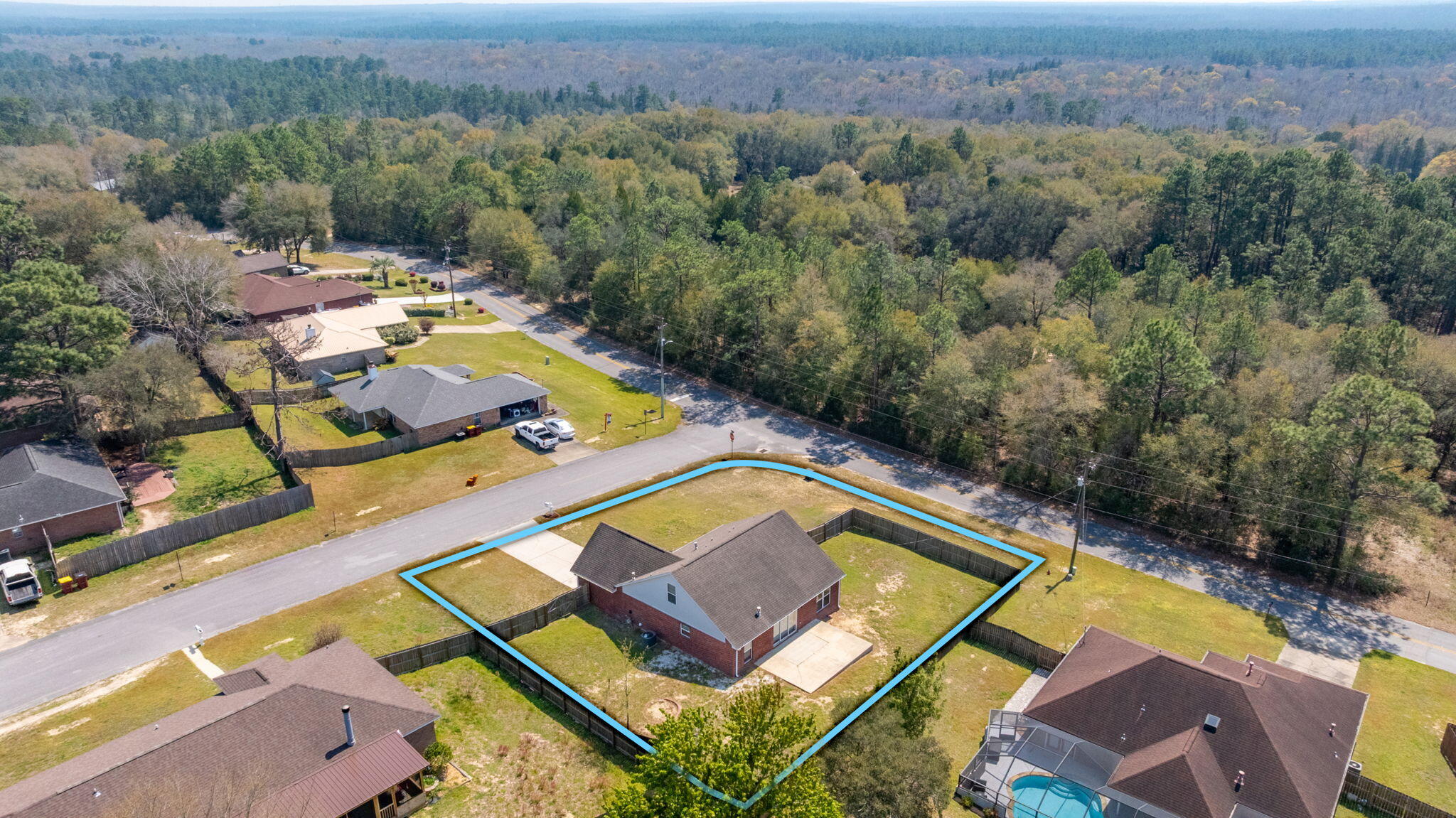 903 Twain Lane Crestview, FL 32536 - Photo 54 of 58 an aerial view of a house with a big yard