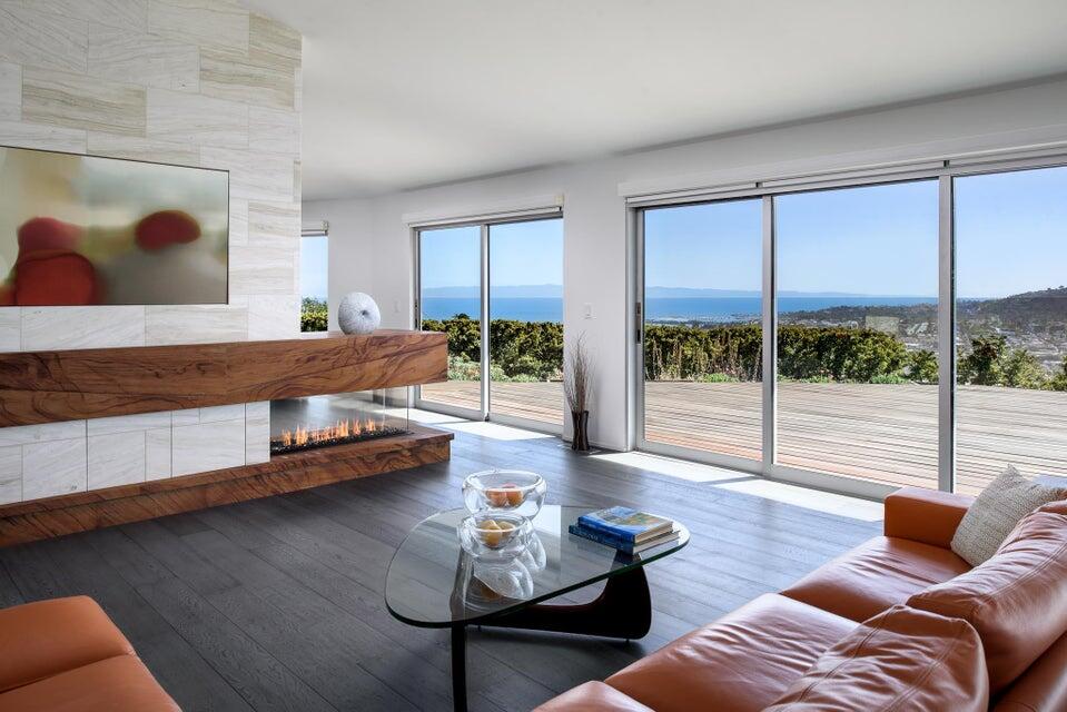 80 Chase Drive Santa Barbara, CA 93108 - Photo 1 of 18 a living room with furniture and a large window