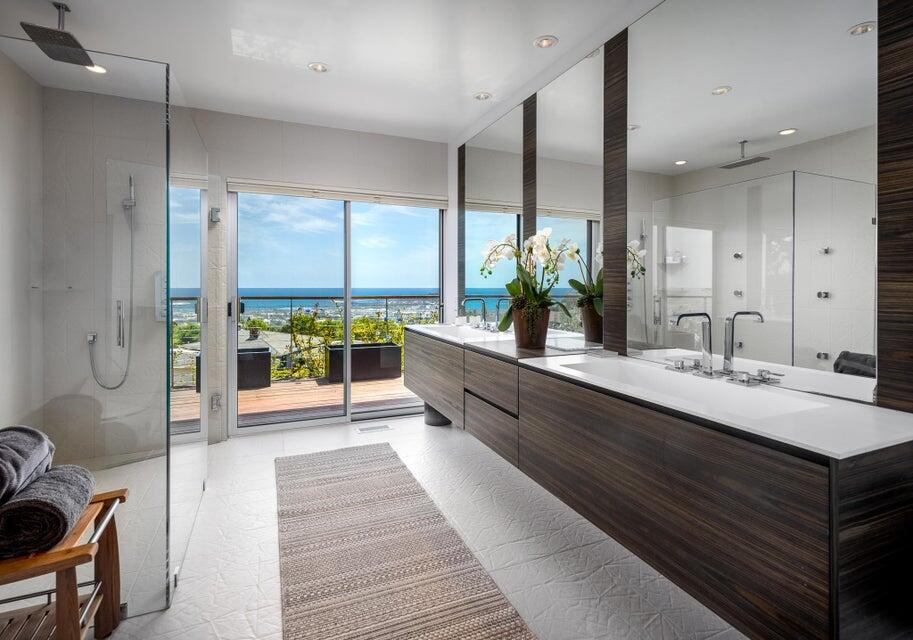 80 Chase Drive Santa Barbara, CA 93108 - Photo 11 of 18 a spacious bathroom with a double vanity sink and a large mirror