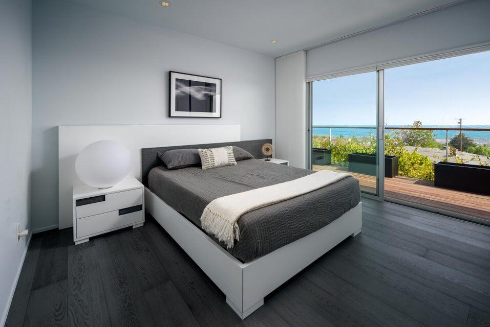 80 Chase Drive Santa Barbara, CA 93108 - Photo 13 of 18 a bed room with a bed and a couch