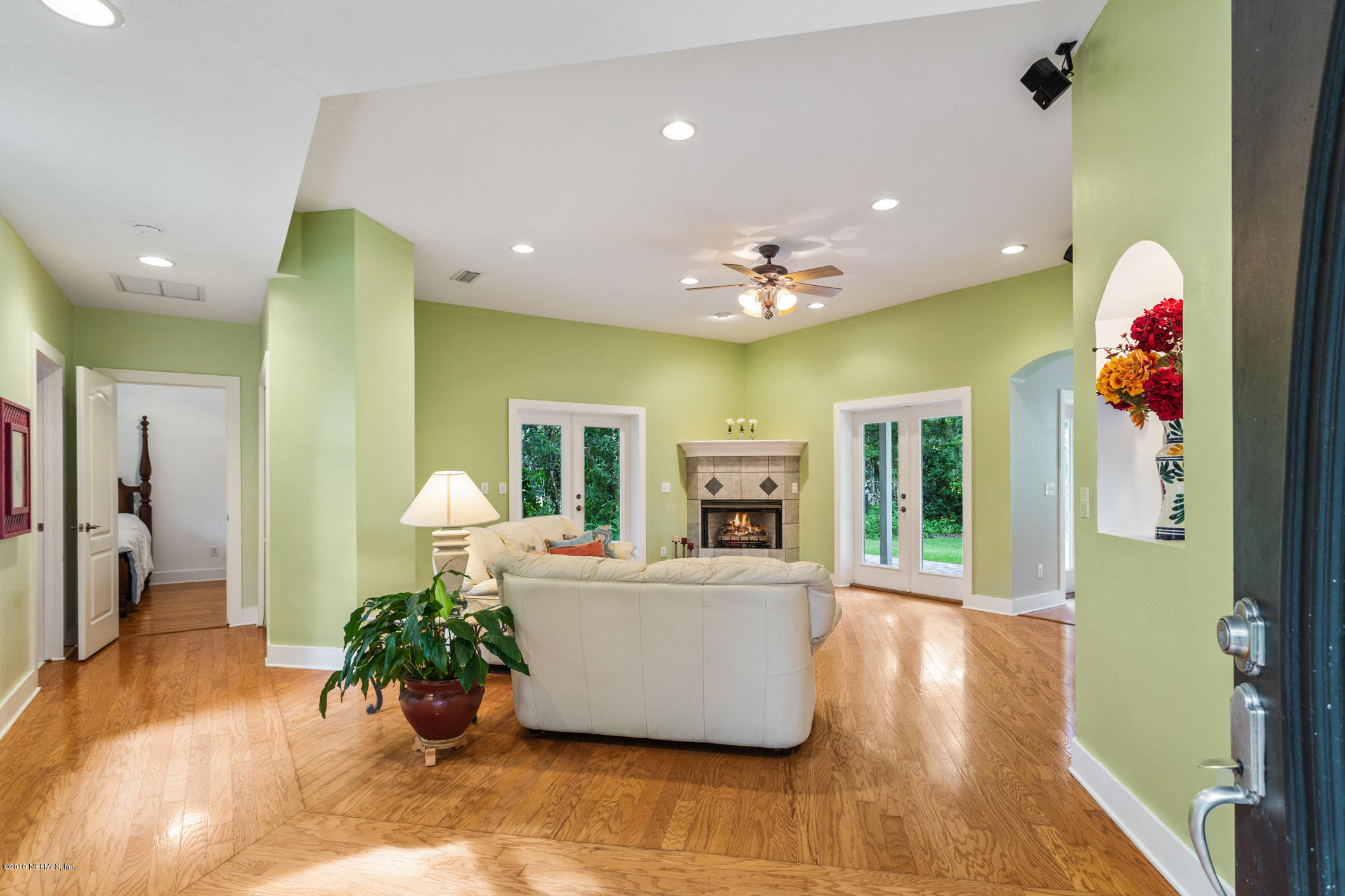 12940 Brady Road Jacksonville, FL 32223 - Photo 15 of 31 a living room with furniture and kitchen view