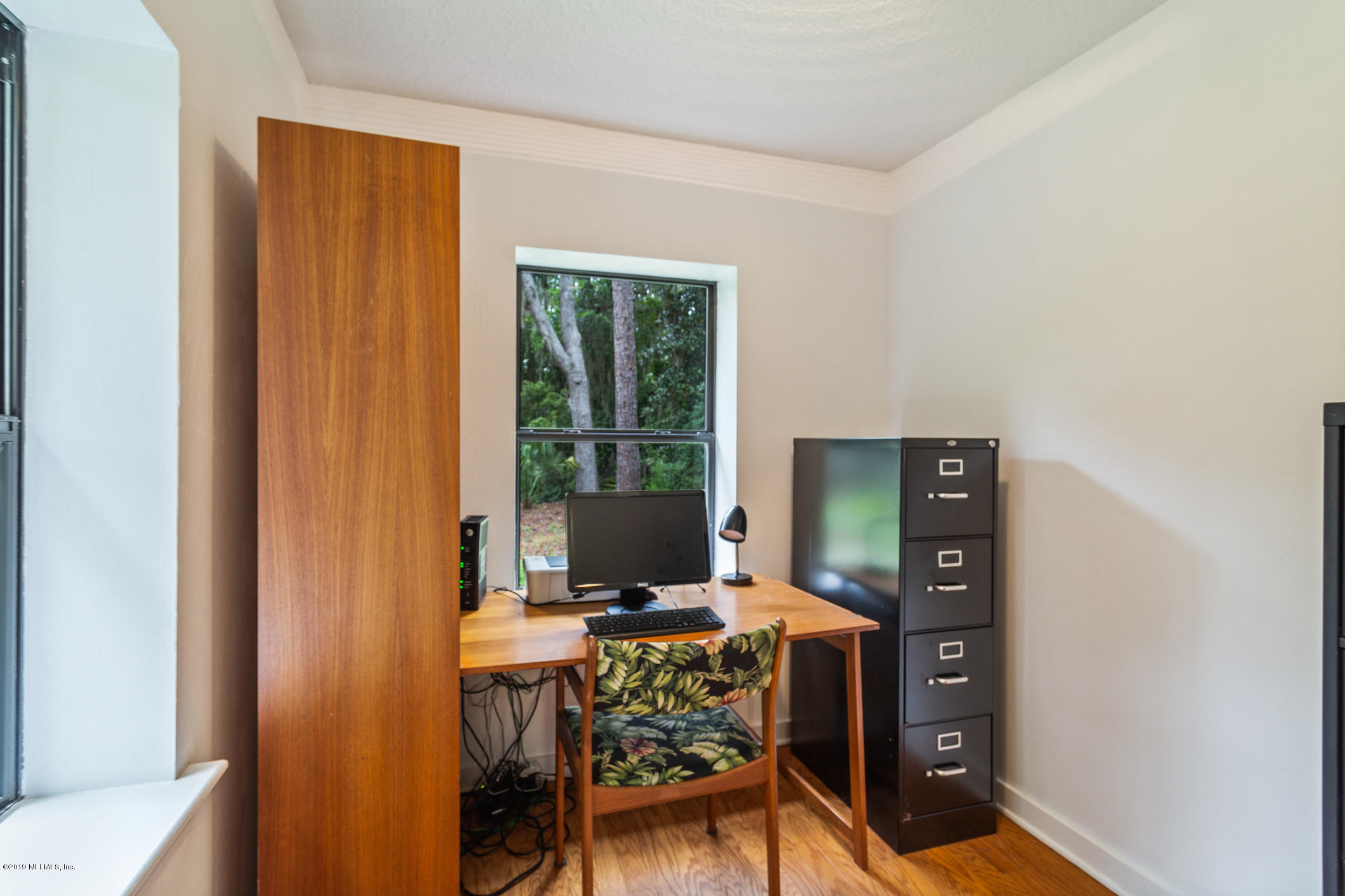 12940 Brady Road Jacksonville, FL 32223 - Photo 17 of 31 a workspace with furniture and window