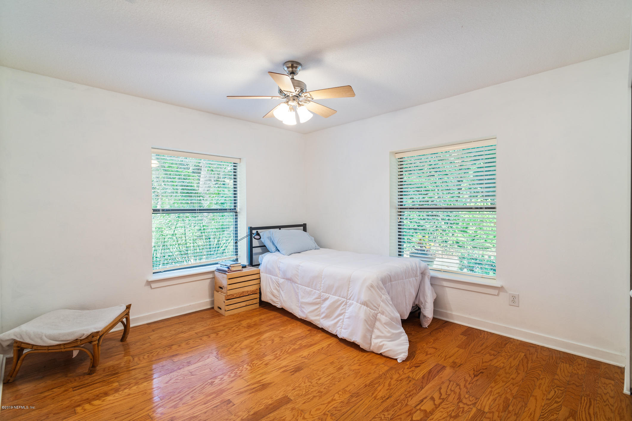 12940 Brady Road Jacksonville, FL 32223 - Photo 22 of 31 a bedroom with a bed and a window