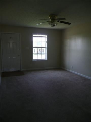 124 Gleaves Lane Oak Grove, KY 42262 - Photo 3 of 14 a view of an empty room with a window