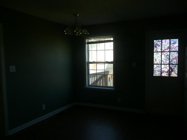124 Gleaves Lane Oak Grove, KY 42262 - Photo 6 of 14 a view of an empty room and window