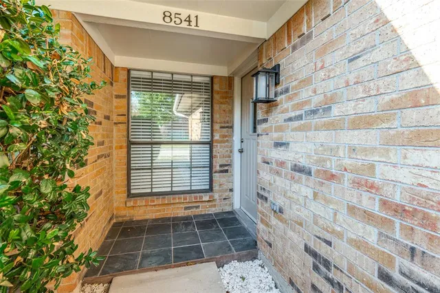 a view of shower and a window