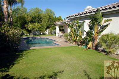40 Abby Road Rancho Mirage, CA 92270 - Photo 2 of 6 a view of a house with a garden