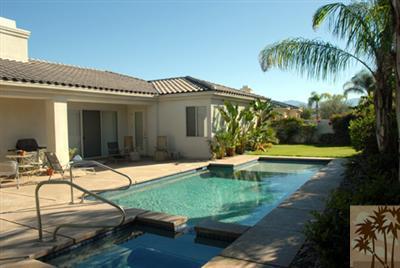40 Abby Road Rancho Mirage, CA 92270 - Photo 4 of 6 a view of a house with swimming pool and sitting area