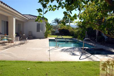 40 Abby Road Rancho Mirage, CA 92270 - Photo 5 of 6 a swimming pool with barbeque oven