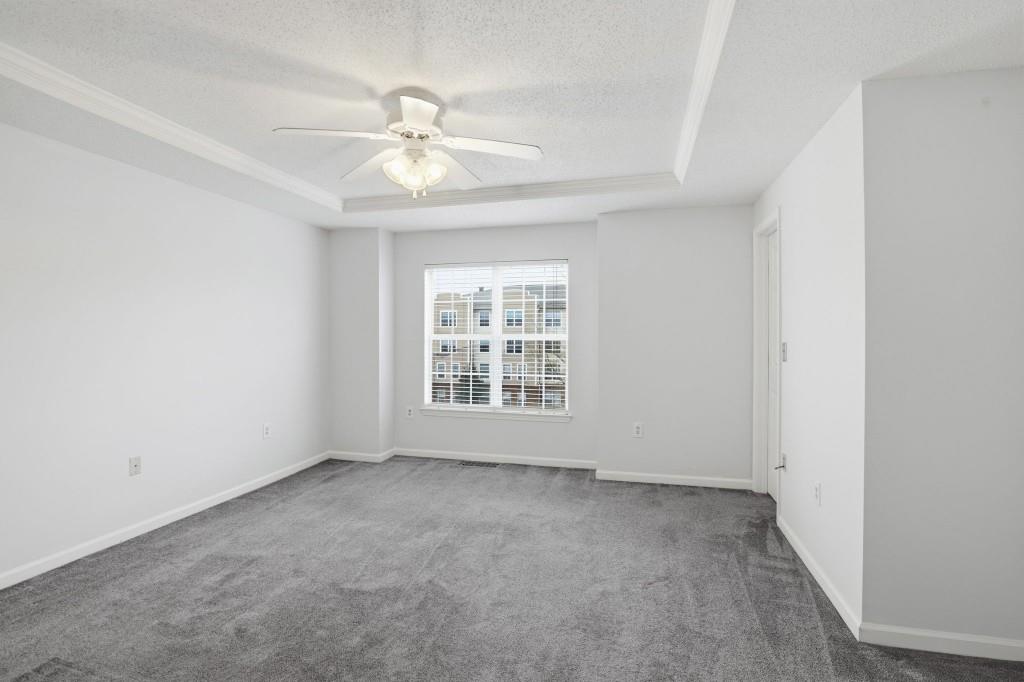 1732 Pryor Road Southwest, Unit 803 Atlanta, GA 30315 - Photo 13 of 26 a view of an empty room with a window