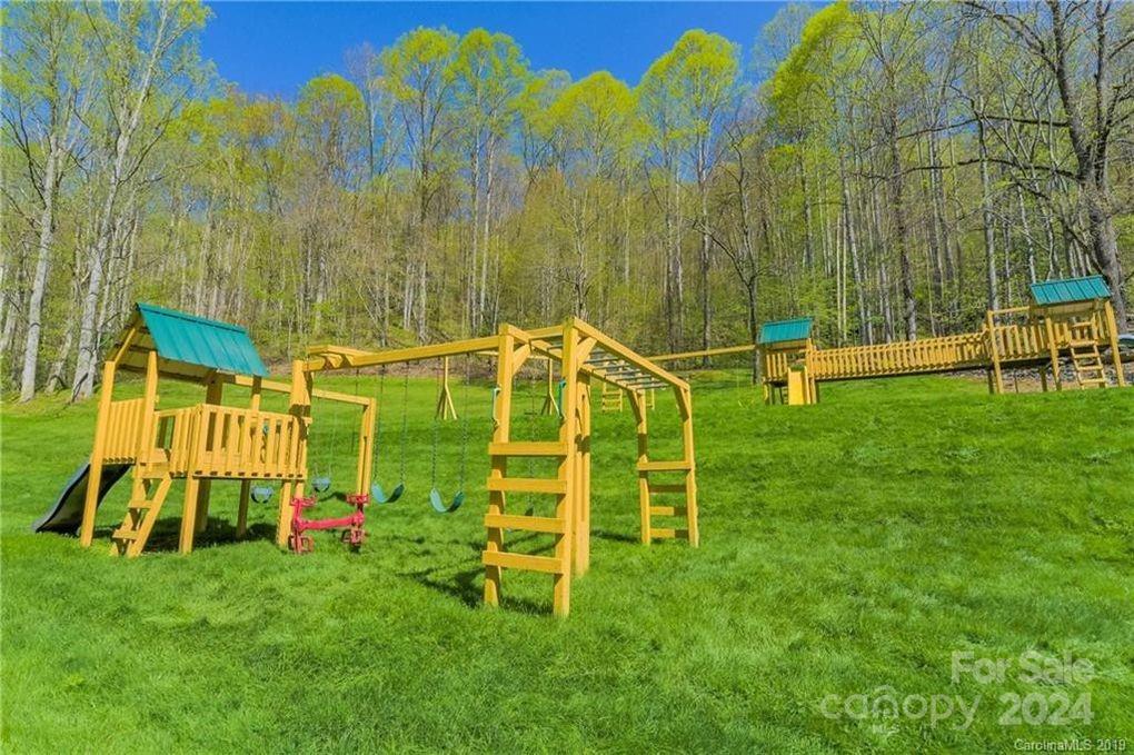 a view of a park with swings