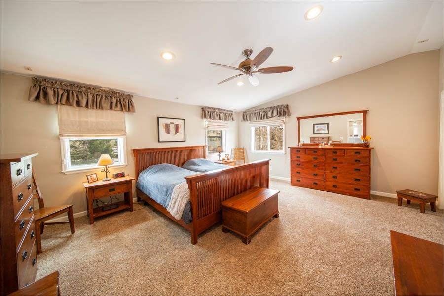 53 Big Elk Road Dillon, CO 80435 - Photo 17 of 33 a bedroom with a bed couch and window