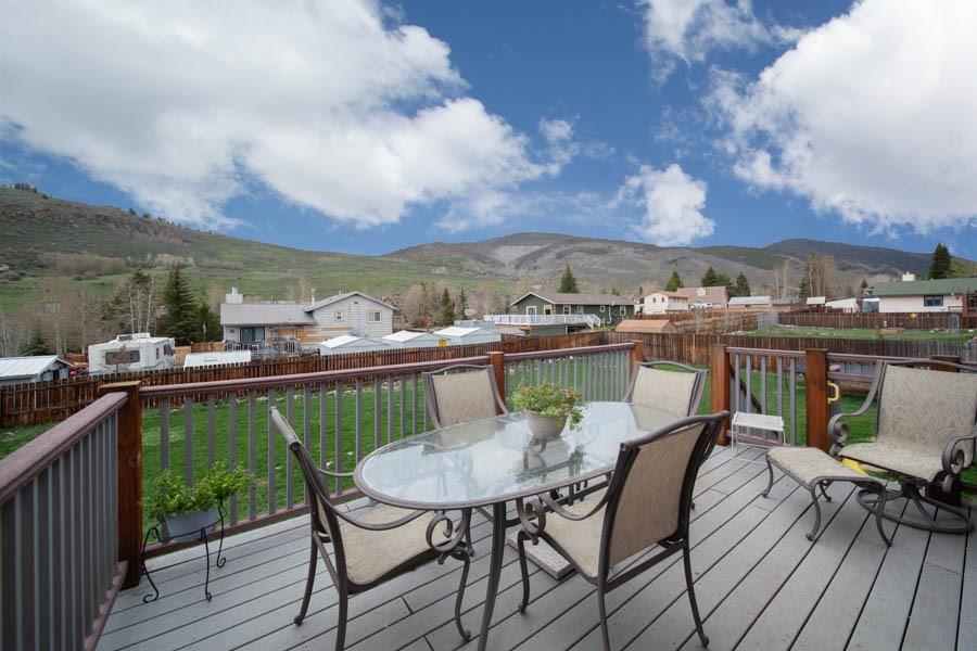 53 Big Elk Road Dillon, CO 80435 - Photo 31 of 33 a view of a chairs and table in patio