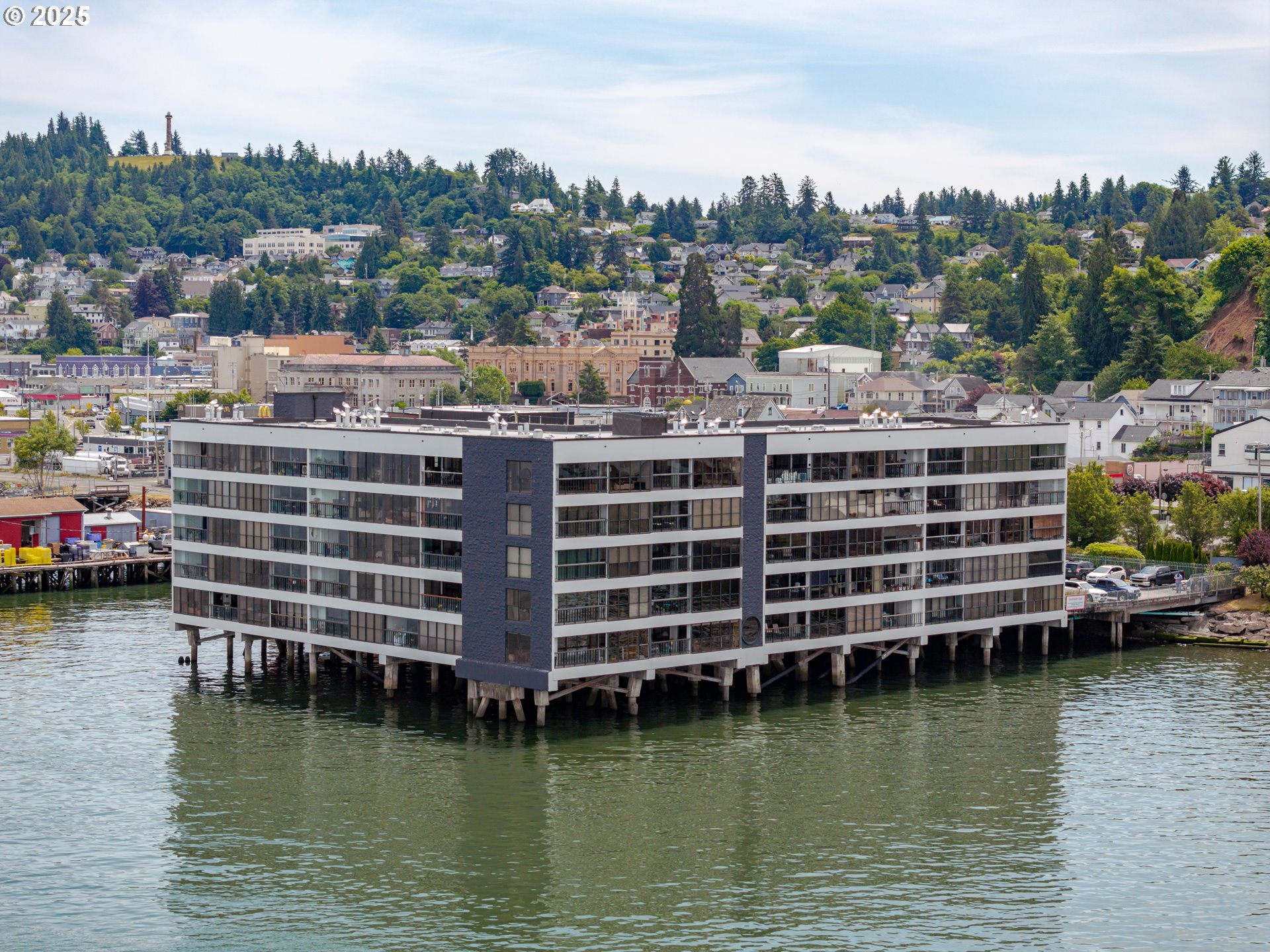 1 3rd Street, Unit 209 Astoria, OR 97103 - Photo 2 of 37 a view of a lake with houses