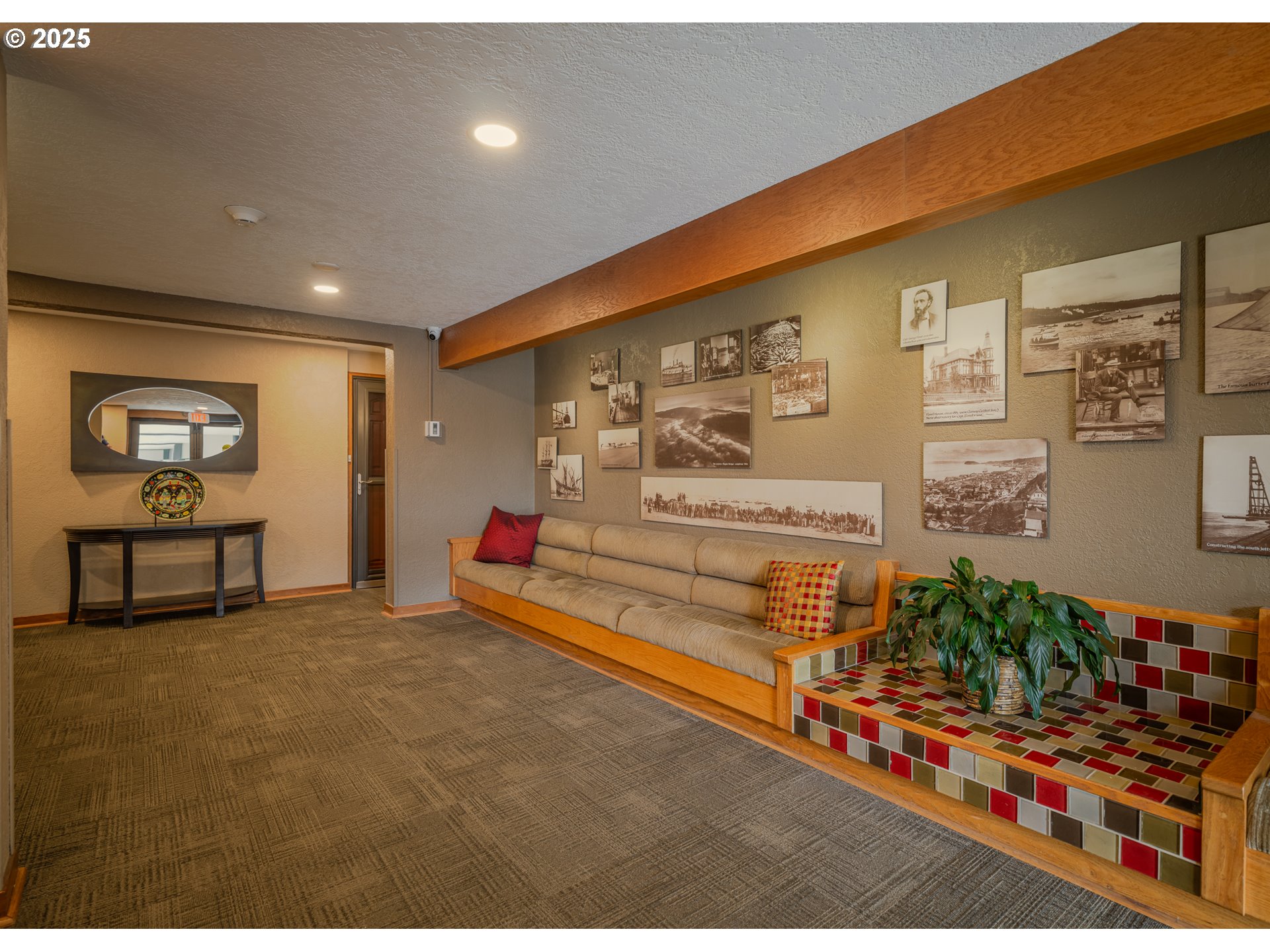 1 3rd Street, Unit 209 Astoria, OR 97103 - Photo 6 of 37 a view of an empty room with wooden floor
