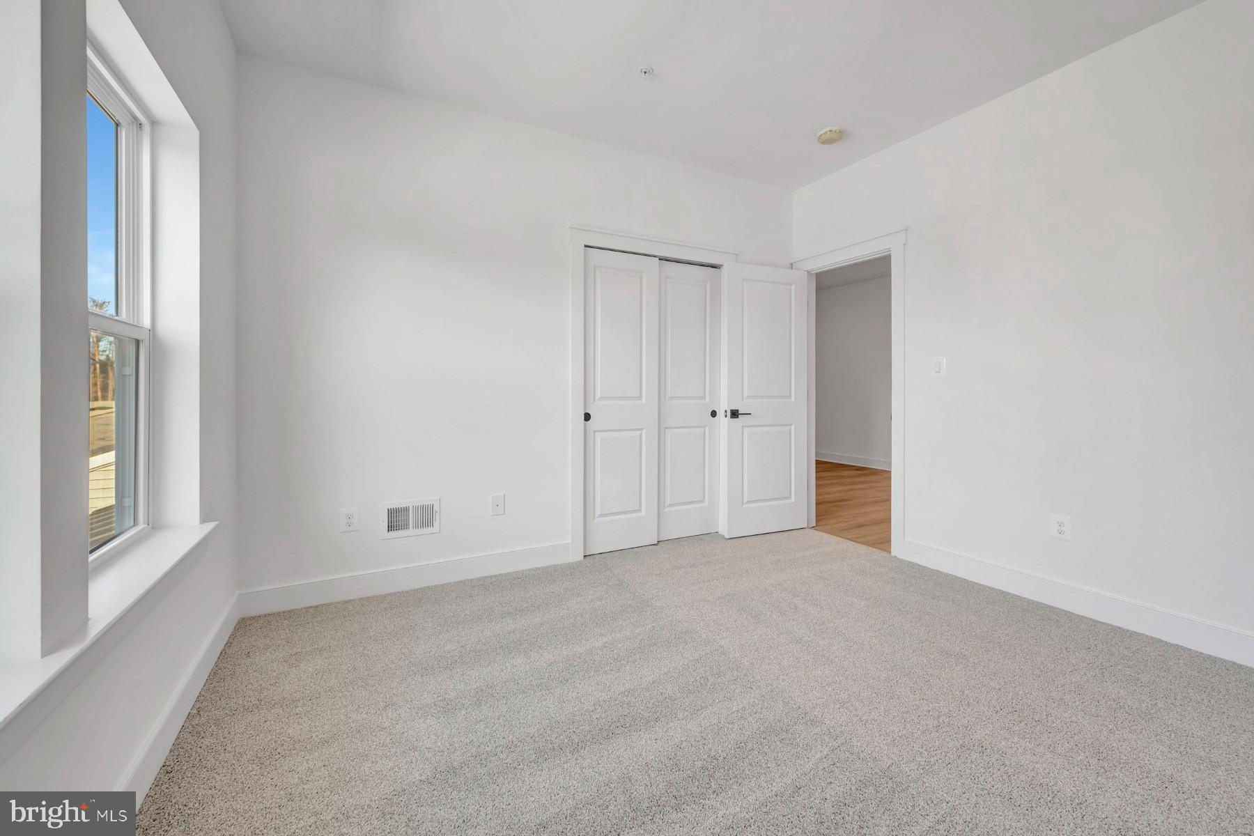 4803 Grandiflora Circle Perry Hall, MD 21128 - Photo 19 of 30 an empty room with windows