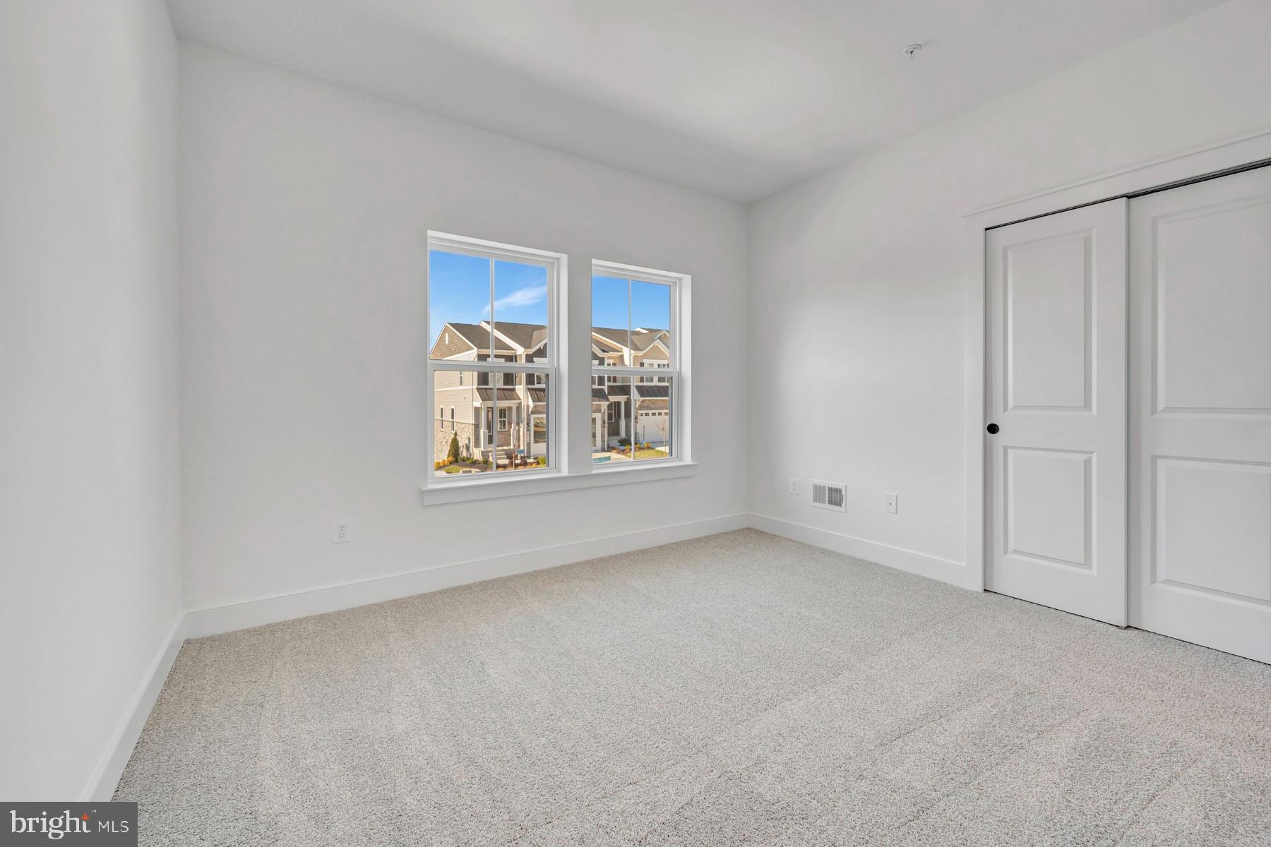 4803 Grandiflora Circle Perry Hall, MD 21128 - Photo 20 of 30 a view of an empty room with a window