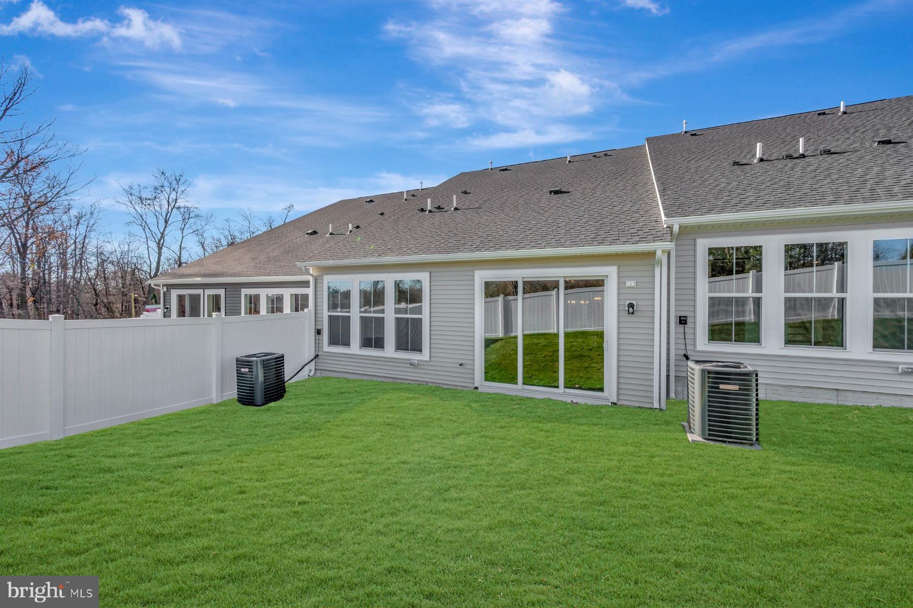 4803 Grandiflora Circle Perry Hall, MD 21128 - Photo 29 of 30 a view of a house with a yard and sitting area
