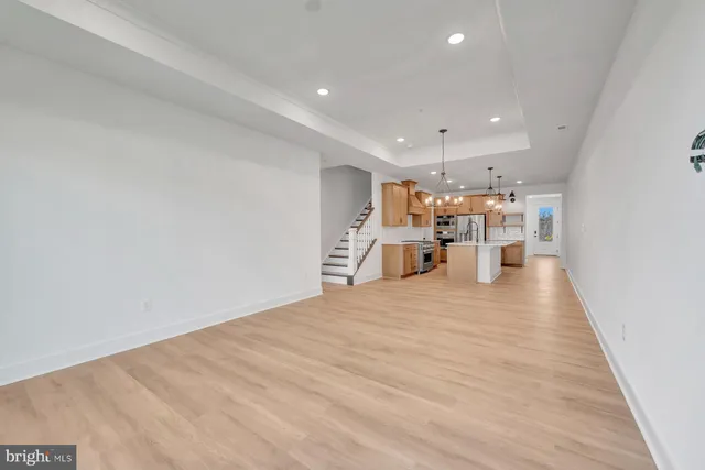 a view of a kitchen with a sink