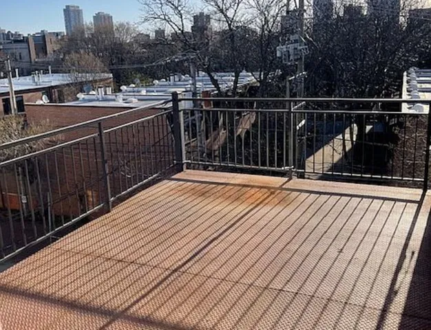 a view of balcony with deck and outdoor space