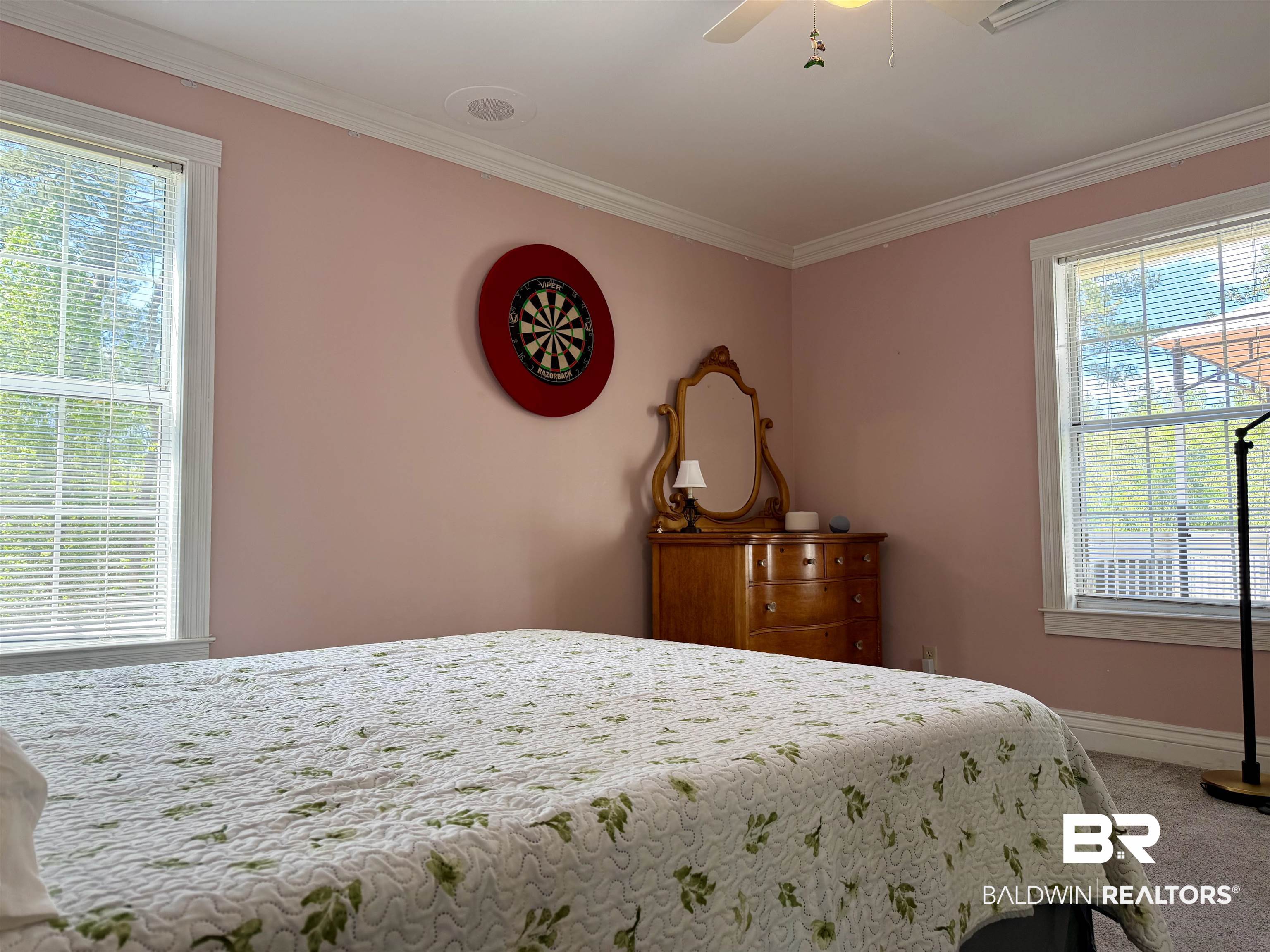 2944 Appleton Road Brewton, AL 36426 - Photo 24 of 65 Bedroom with multiple windows, ornamental molding, carpet flooring, and a ceiling fan