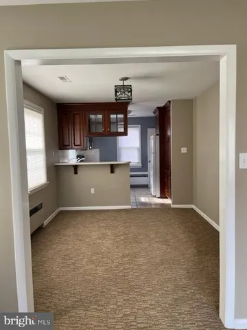 a view of kitchen with a sink