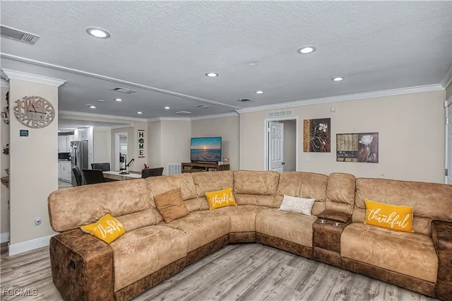 a living room with furniture and a couch