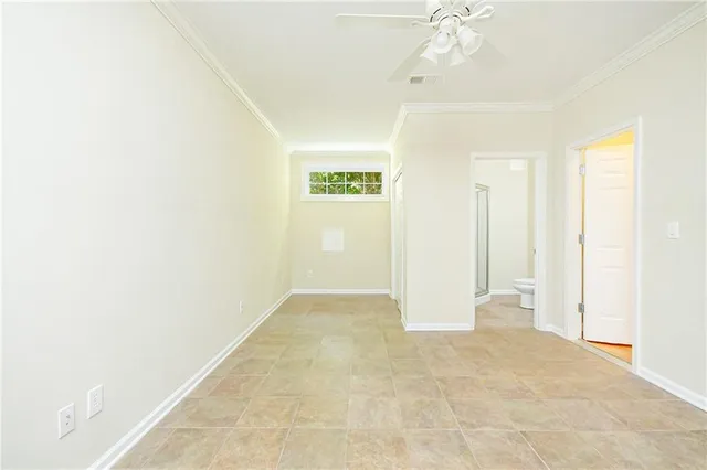 a view of a chairs and table in the balcony