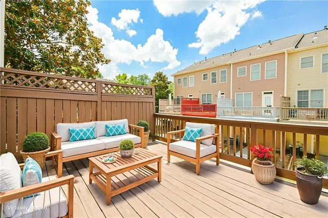 a balcony with wooden floor