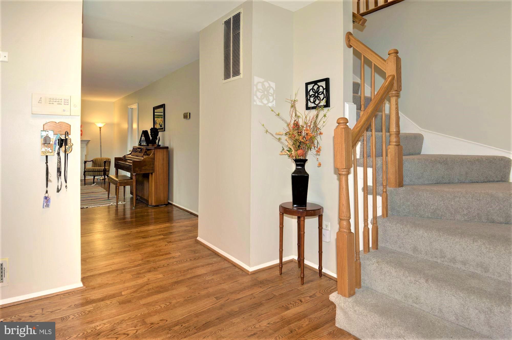 2305 Rosedown Drive Reston, VA 20191 - Photo 2 of 43 Open Foyer with new hardwood floors